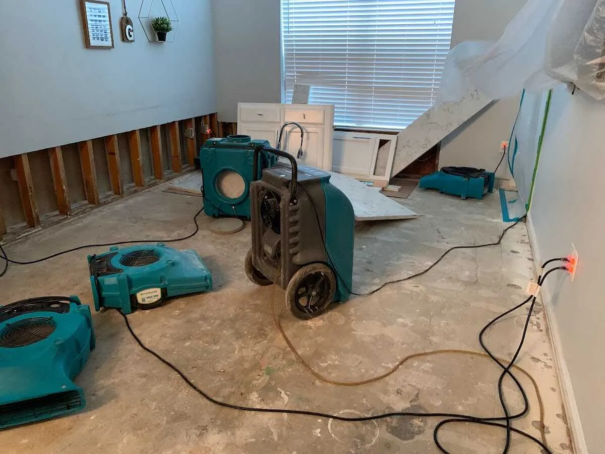 Dehumidifier in flood-cut room for Water Damage Restoration in Farmington